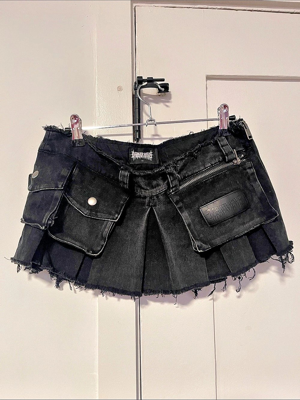 Darker Wavs black denim pleated utility pocket mini skirt